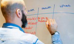 Fokus auf Teilnehmer während eines Seminars